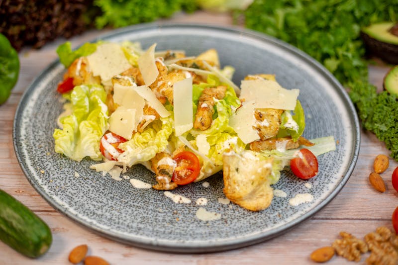 Grilled Chicken Caesar Salad with parmesan and croutons