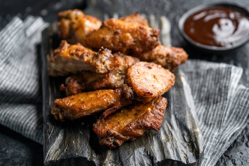 Crispy Buffalo Wings with blue cheese dipping sauce